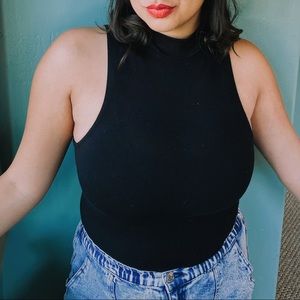 Turtle neck sleeveless top
